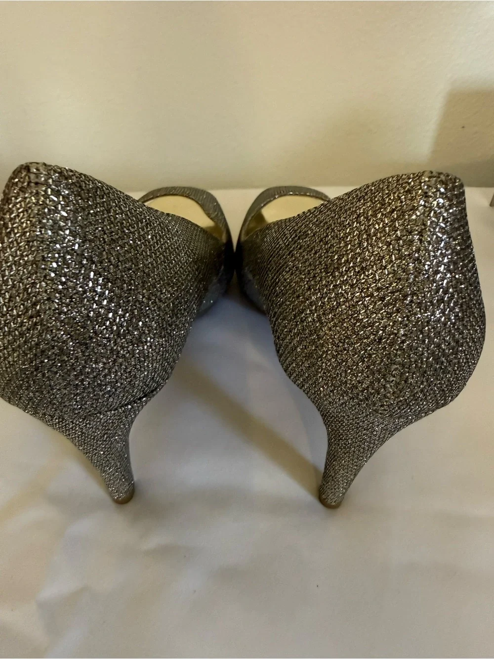 Bandolino Silver Glitter Peep-Toe Stiletto Heels, available in size 9 wide.